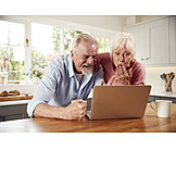  Laptop, Blowing A Kiss, Older Couple